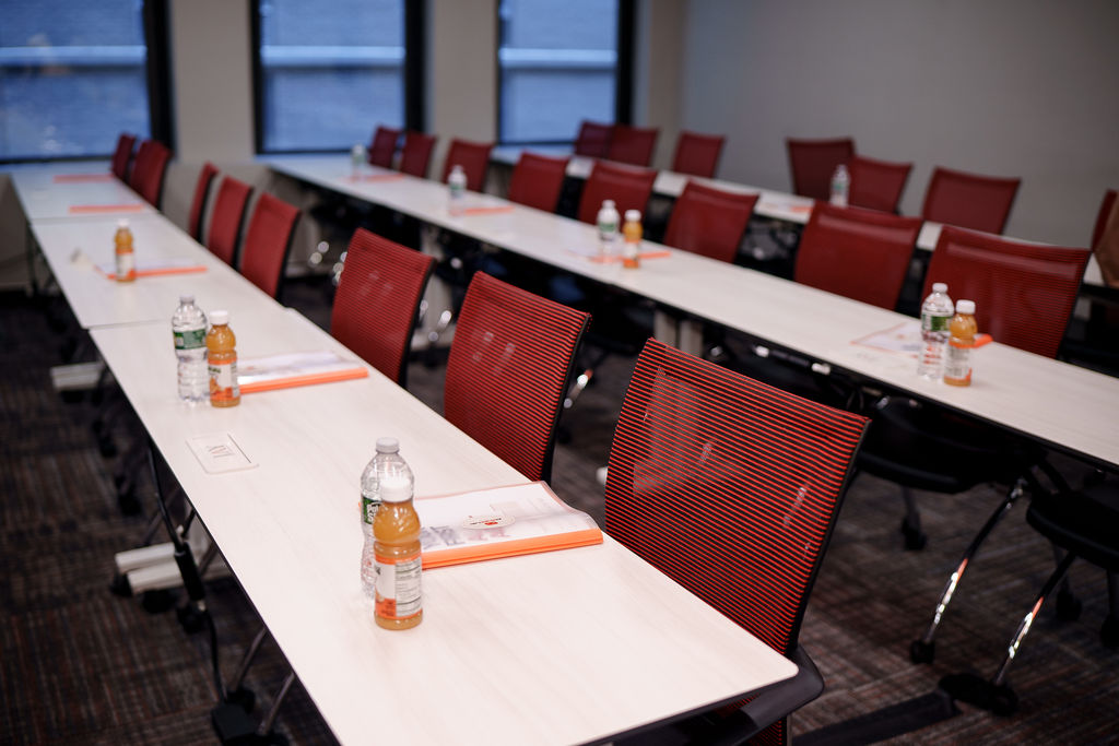 Wide view of people working in the event room